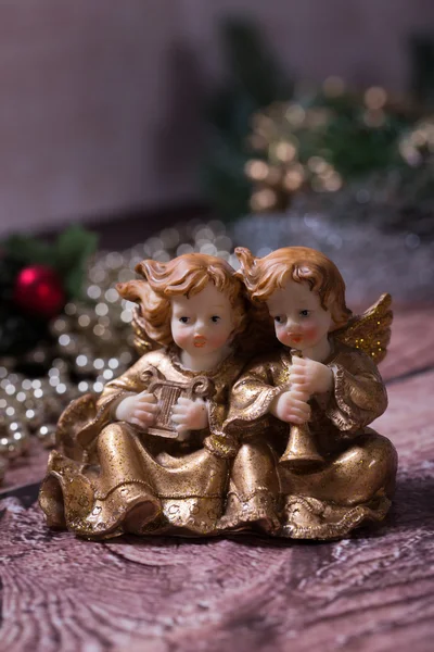 Christmas angels singing and playing on the harp and trumpet — Stock Photo, Image