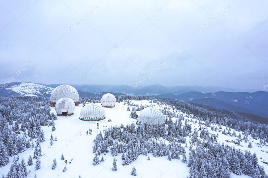 Aerial view of Pamir old military radar station, USSR secret military site, dawn at the former radar station, military unit with antennas, Carpathians, Ukraine