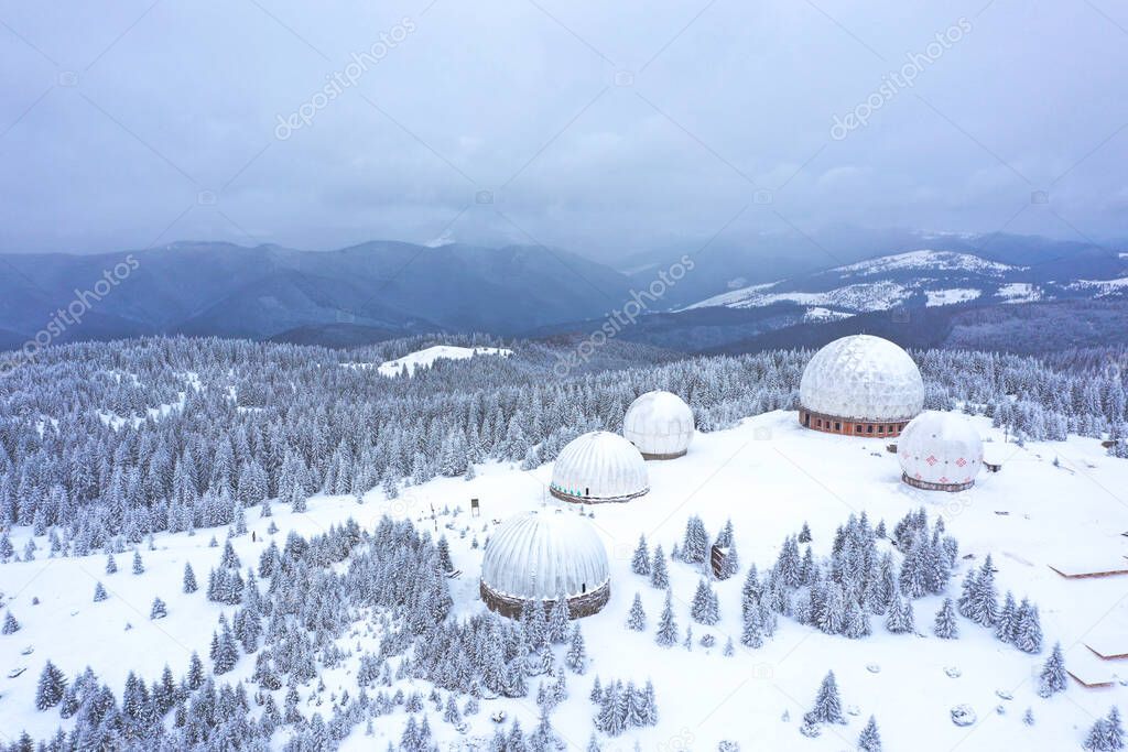 Aerial view of Pamir old military radar station, USSR secret military site, dawn at the former radar station, military unit with antennas, Carpathians, Ukraine