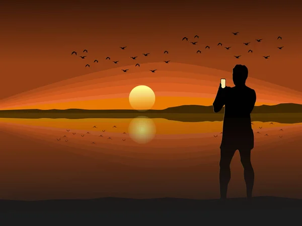 Silhouette Uomo Che Tiene Mano Cellulare Scattare Una Foto Tramonto — Vettoriale Stock