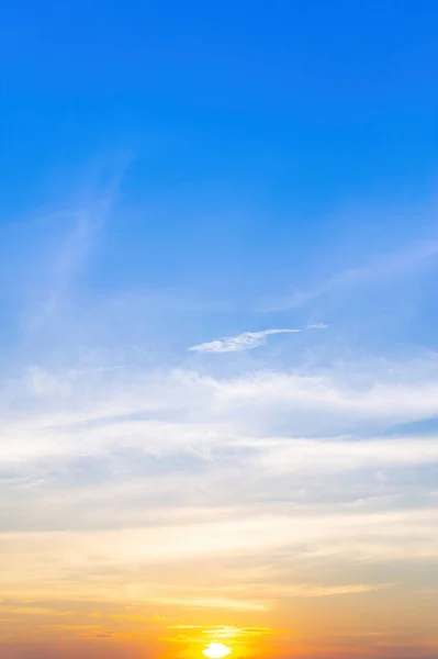 The morning sky looked like a bright golden sky. The sunrise is decorated with clouds in various shapes. Looks beautiful.