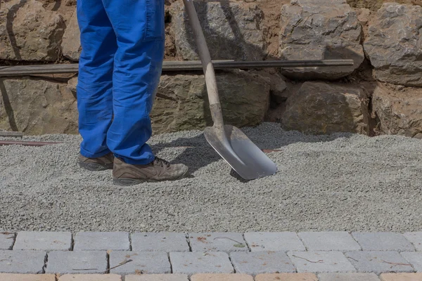 Endireitar uma superfície pavimentada — Fotografia de Stock