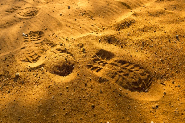 Voetafdrukken in zand — Stockfoto