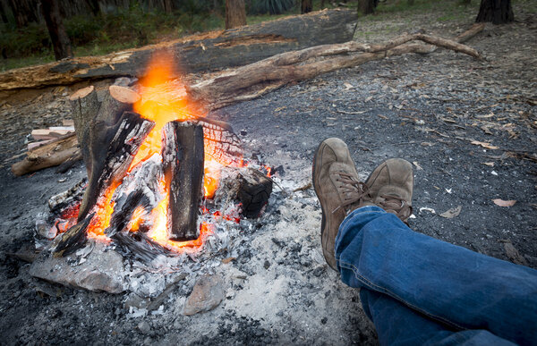 Warming Feet by Campfire