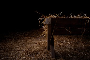 Empty manger at night clipart