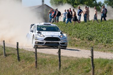 MIKOLAJKI, POLAND - JUL 3: Kris Meeke and his codriver Paul Nagle in a Citroen DS3 WRC race in the 72nd Rally Poland, on July 3, 2015 in Mikolajki, Poland.