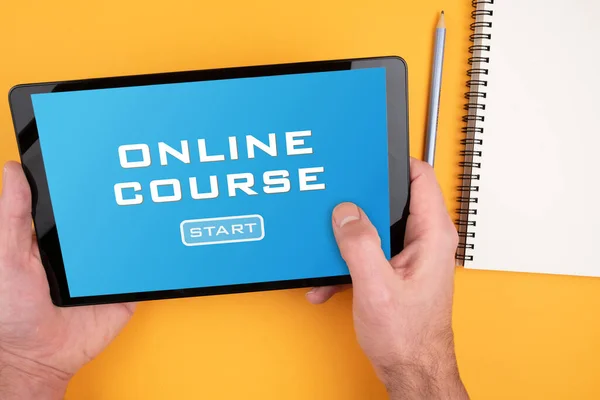 person participating in online course on tablet computer