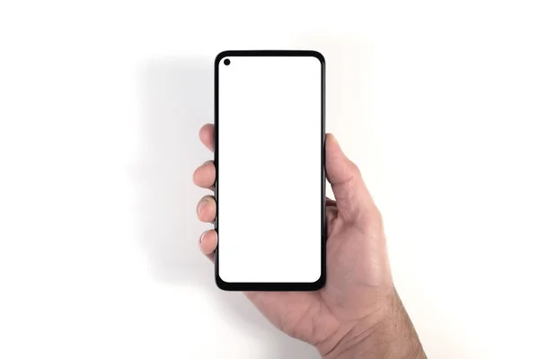 Smartphone de mano con pantalla blanca en blanco sobre fondo blanco — Foto de Stock