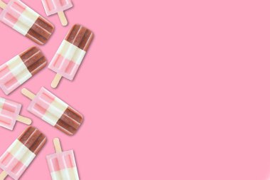 Parlak sarı arka planda parlak pembe buzlu şekerlerin yan sınırı. Boşluğu kopyala.