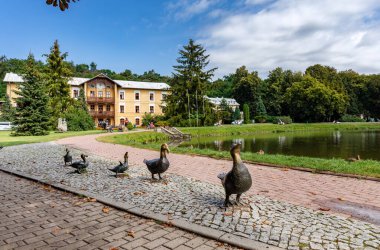 NALECZOW, POLAND - AUGUST 24, 2020: Duke Joseph Sanatorium located in the Spa Park. Known polish health resort originated in XVIII century. clipart