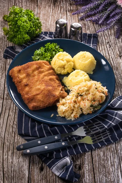 Breaded Fish Potato Salad Sauerkraut Dinner Selective Focus — Stock Photo, Image
