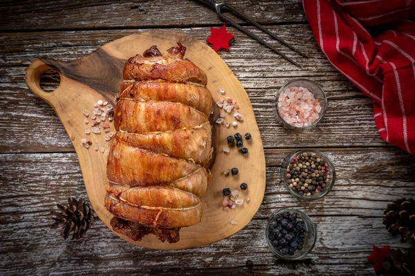 Baked Rolled Bacon Wooden Chopping Board Top View — Stock Photo, Image