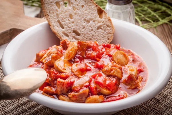 Lecho - stew with peppers, onions and sausages. — Stock Photo, Image