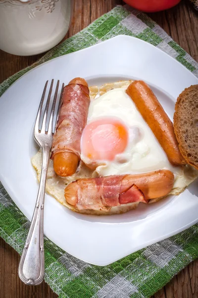 Tasty breakfast on wooden table. — Stock Photo, Image