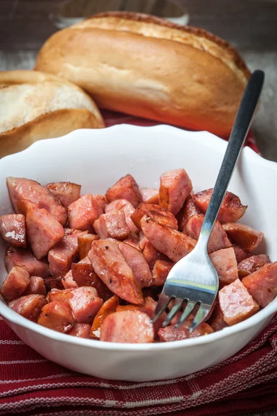 Pieces of sausage fried. — Stock Photo, Image