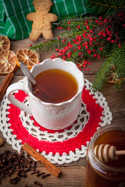 Winter hot drink with spices on wooden table. — Stock Photo, Image