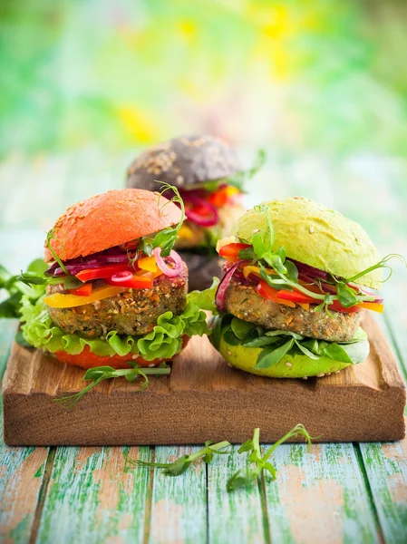 Hamburger rossi, verdi, neri — Foto Stock
