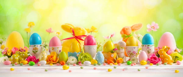 Easter Concept Colorful Decorated Eggs Egg Cups Rabbits Flowers White — Φωτογραφία Αρχείου