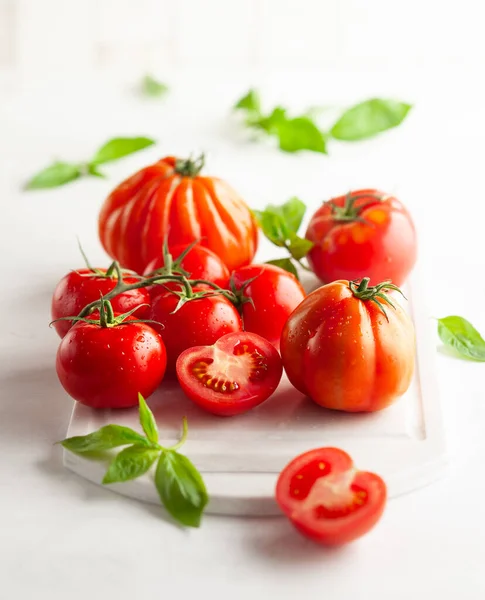 Assorted Fresh Ripe Tomatoes Basil White Board Healthy Food Concept — Stock Photo, Image
