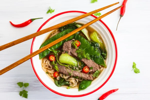 Spicy Asian beef soup — Stock Photo, Image