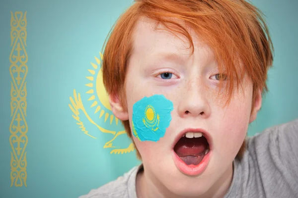 Redhead fan boy with kazakh flag painted on his face — Stock Photo, Image