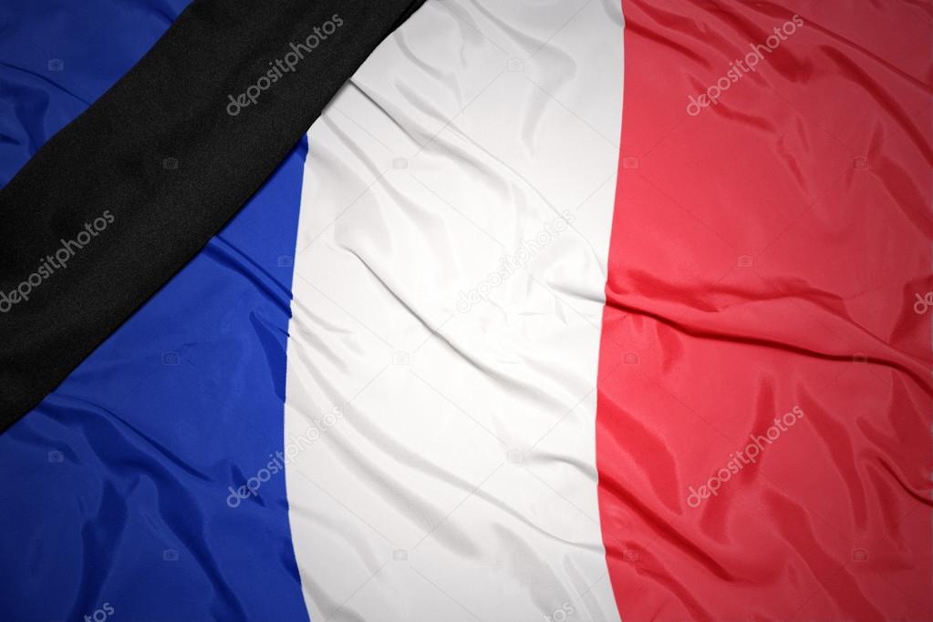 national flag of france with black mourning ribbon 