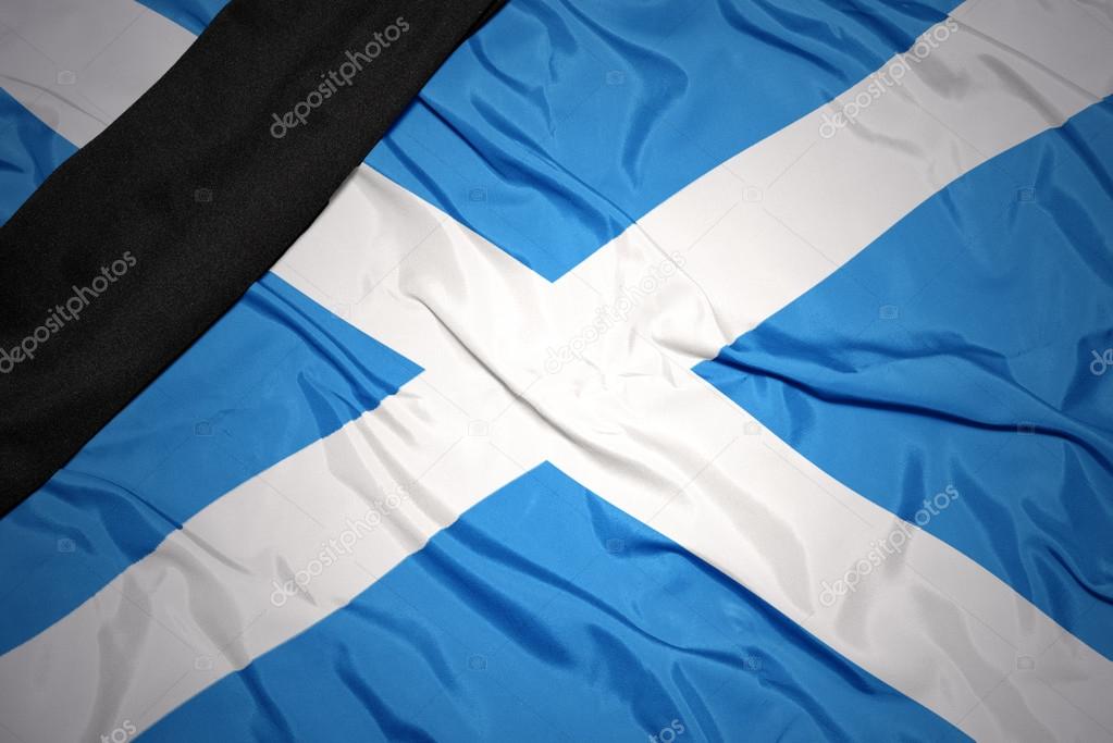 national flag of scotland with black mourning ribbon 