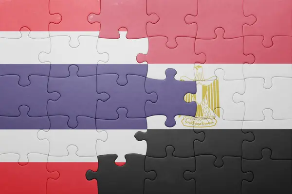 Puzzle s národní vlajkou Thajska a egypt. — Stock fotografie
