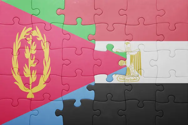 Rompecabezas con la bandera nacional de eritrea y Egipto . — Foto de Stock