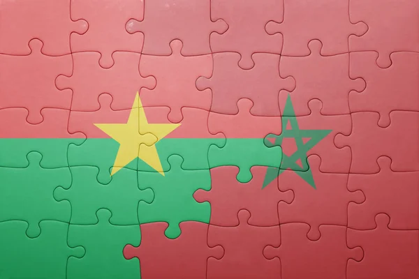 Puzzle with the national flag of morocco and burkina faso . — Stock Photo, Image
