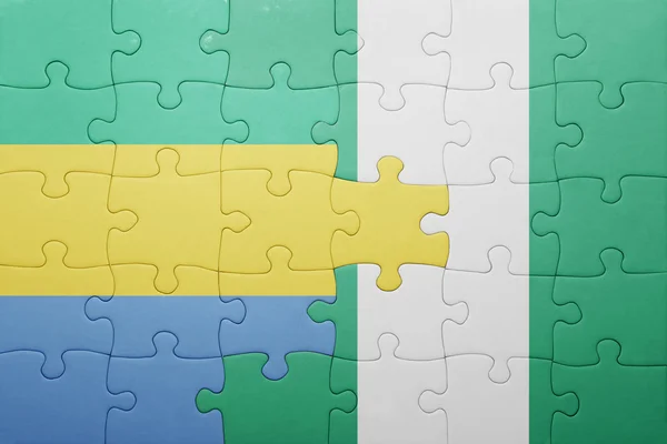 Puzzle with the national flag of gabon and nigeria — Stock Photo, Image