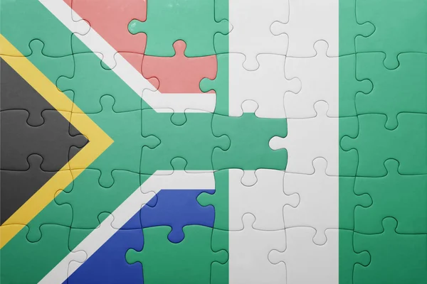 Puzzle with the national flag of south africa and nigeria — Stock Photo, Image