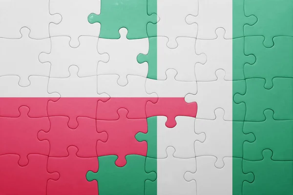 Puzzle con la bandiera nazionale di Polonia e Nigeria — Foto Stock
