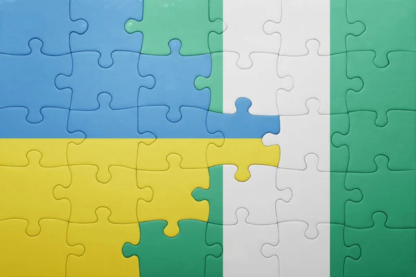 Puzzle with the national flag of ukraine and nigeria — Stock Photo, Image