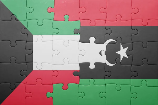 Rompecabezas con la bandera nacional de kuwait y libya — Foto de Stock