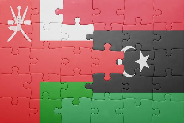 オマーン、リビアの国旗をパズルします。 — ストック写真