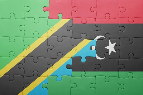 Quebra-cabeça com a bandeira nacional da tanzânia e da Líbia — Fotografia de Stock