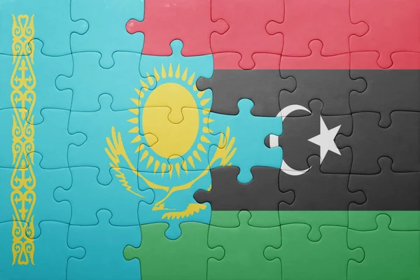 Puzzle con la bandiera nazionale del kazakhstan e libya — Foto Stock