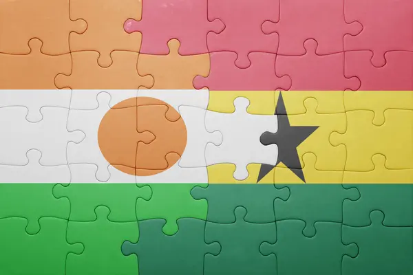Puzzle mit der Nationalflagge von ghana und niger — Stockfoto