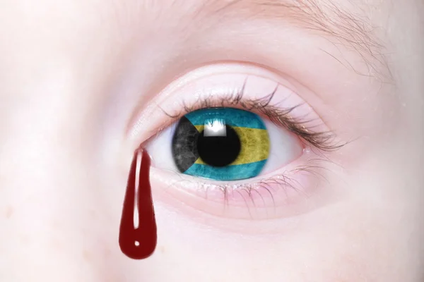 Human 's eye with national flag of bahamas — стоковое фото