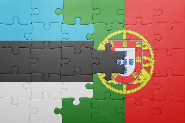 Puzzle z flagi narodowej Portugalii i Estonii — Zdjęcie stockowe