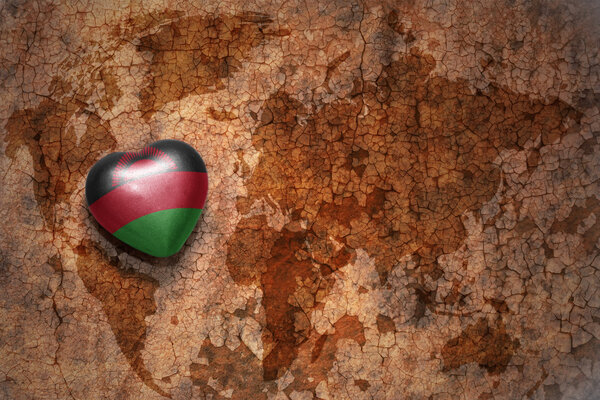 heart with national flag of malawi on a vintage world map crack paper background. 