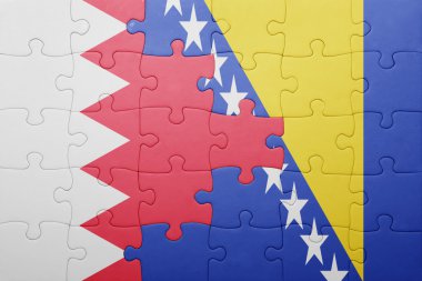 puzzle with the national flag of bosnia and herzegovina and bahrain