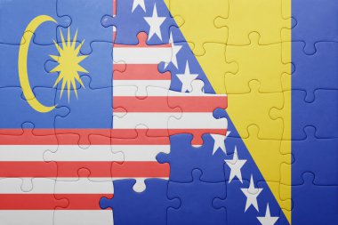 puzzle with the national flag of bosnia and herzegovina and malaysia