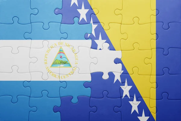 Bosna-hersek ve nikaragua ulusal bayrağı ile bulmaca — Stok fotoğraf