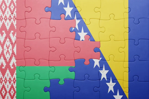 Puzzle with the national flag of bosnia and herzegovina and belarus — Stock Photo, Image