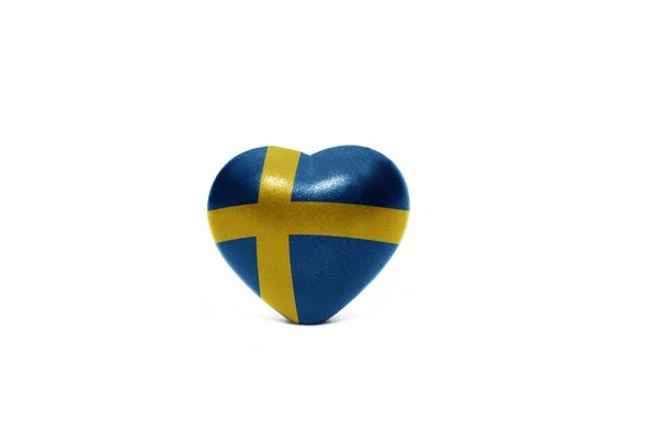 Сердце с национальным флагом Швеции — стоковое фото