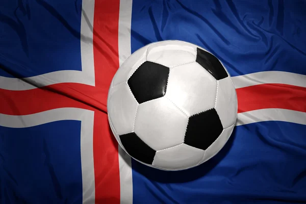 Svart och vit Fotboll boll på den nationella flaggan Islands — Stockfoto