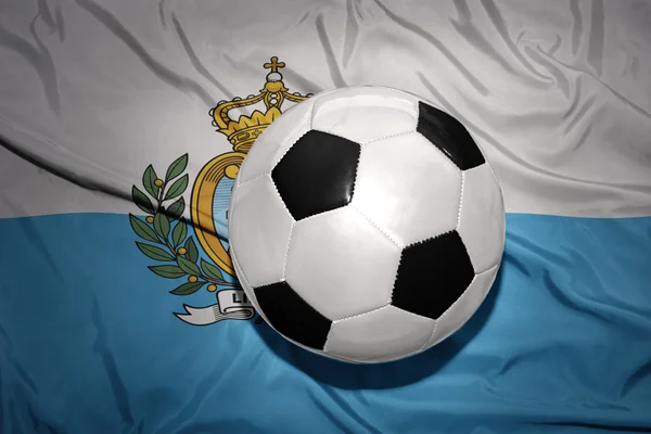 Zwartwit Voetbal bal op de nationale vlag van san marino — Stockfoto