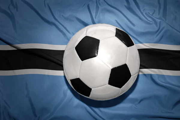 Zwartwit Voetbal bal op de nationale vlag van botswana — Stockfoto